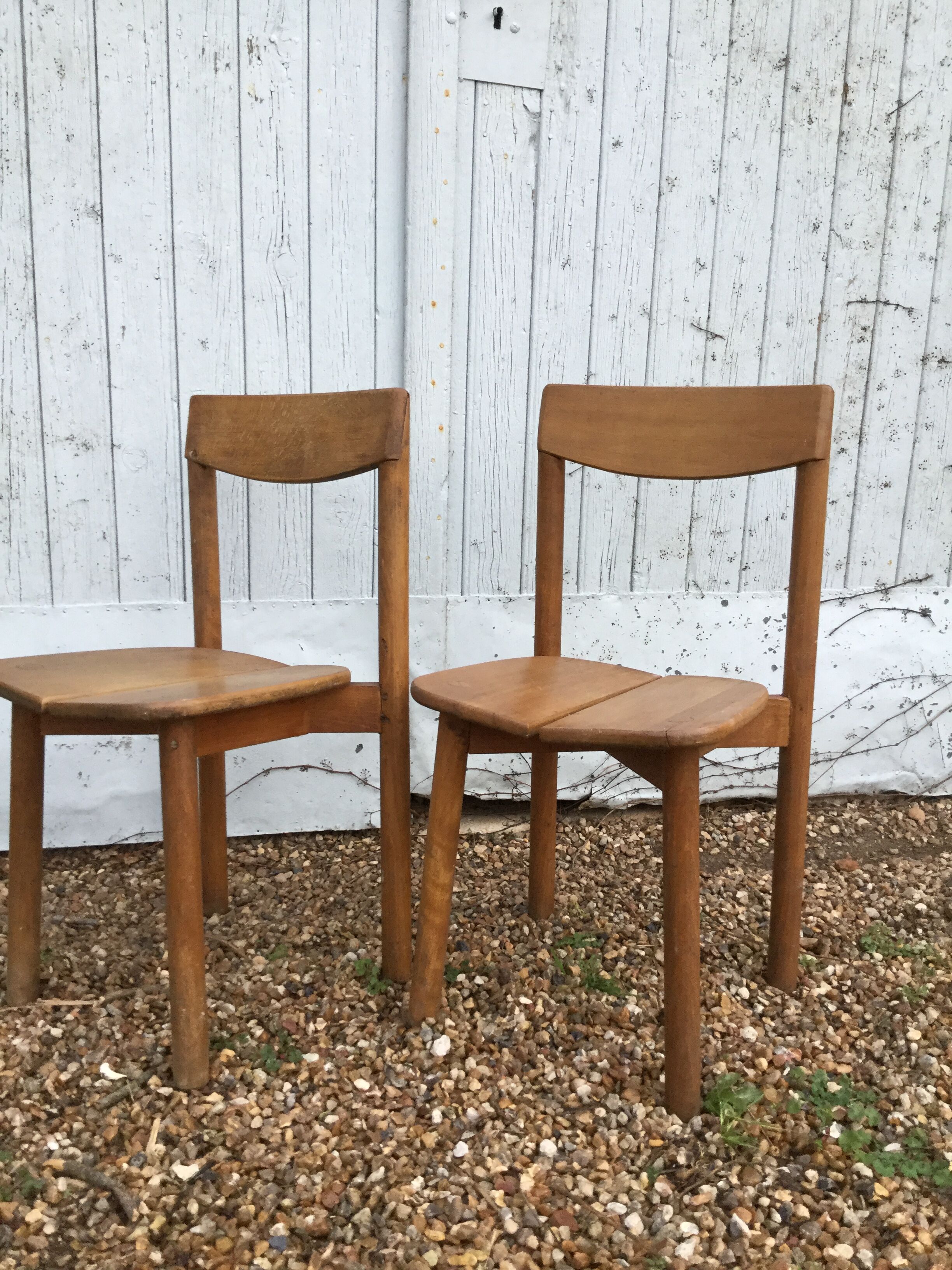 A pair of Chair grain of Café Pierre Gautier - Delaye