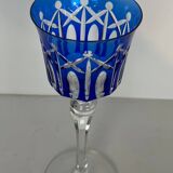 Set of twelve glasses in crystal tinted in different colours and cut with stars.