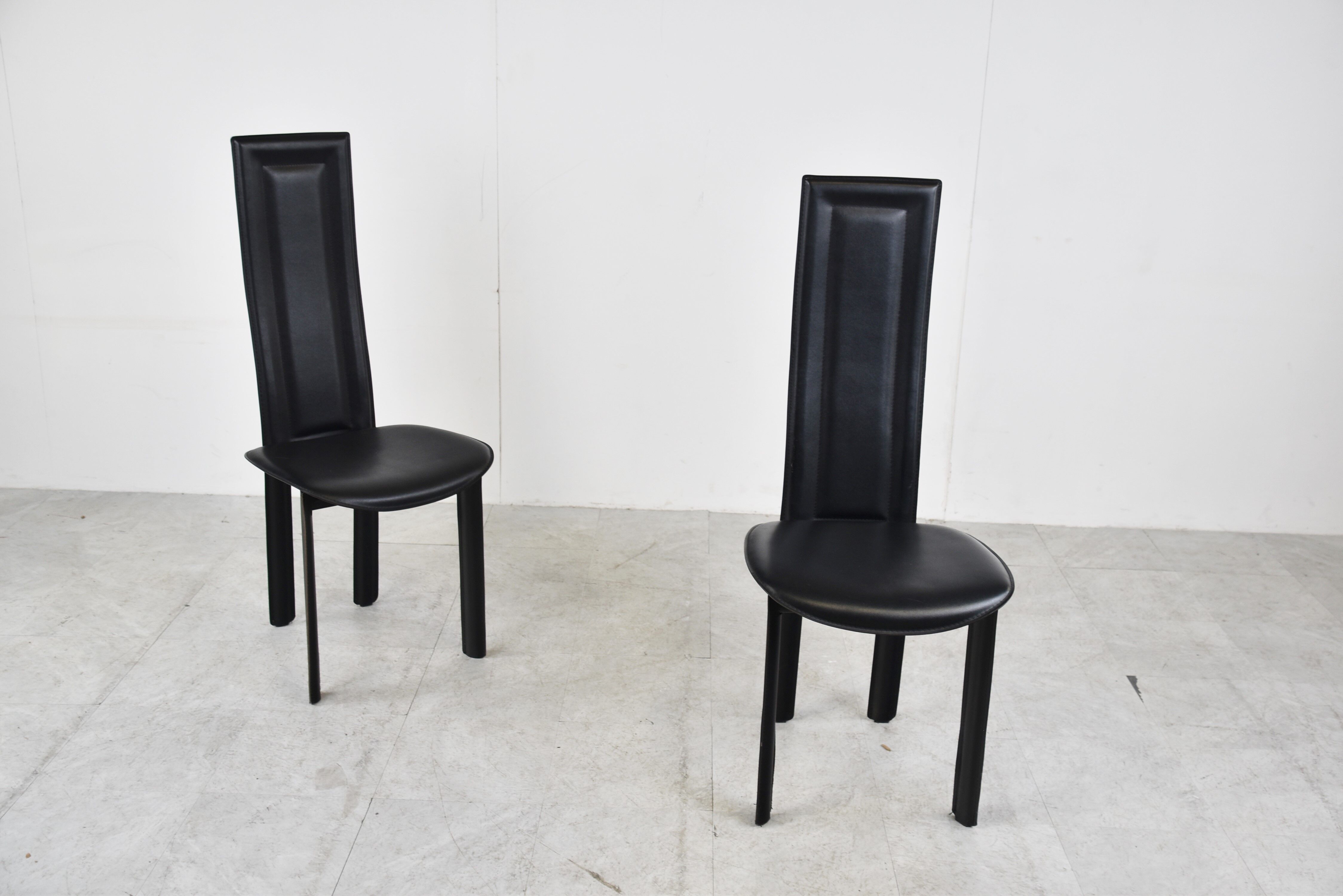 Vintage black leather dining chairs,  1980