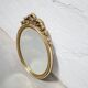 Old oval mirror Louis XVI style in gilded wood 50cm x 34cm