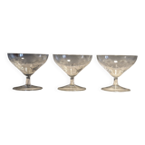 3 antique champagne coupes in engraved crystal with large daisies.