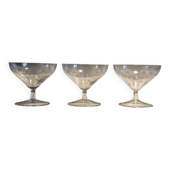 3 antique champagne coupes in engraved crystal with large daisies.