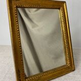 Miroir vintage en bois à poser ou à suspendre de couleur dorée