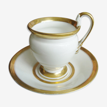 Old cup and saucer in white porcelain and 19th century gold with swan head handle