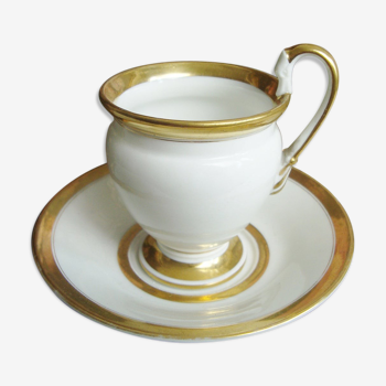 Tasse et soucoupe ancienne en porcelaine blanche et or XIXème avec poignée forme tête de cygne