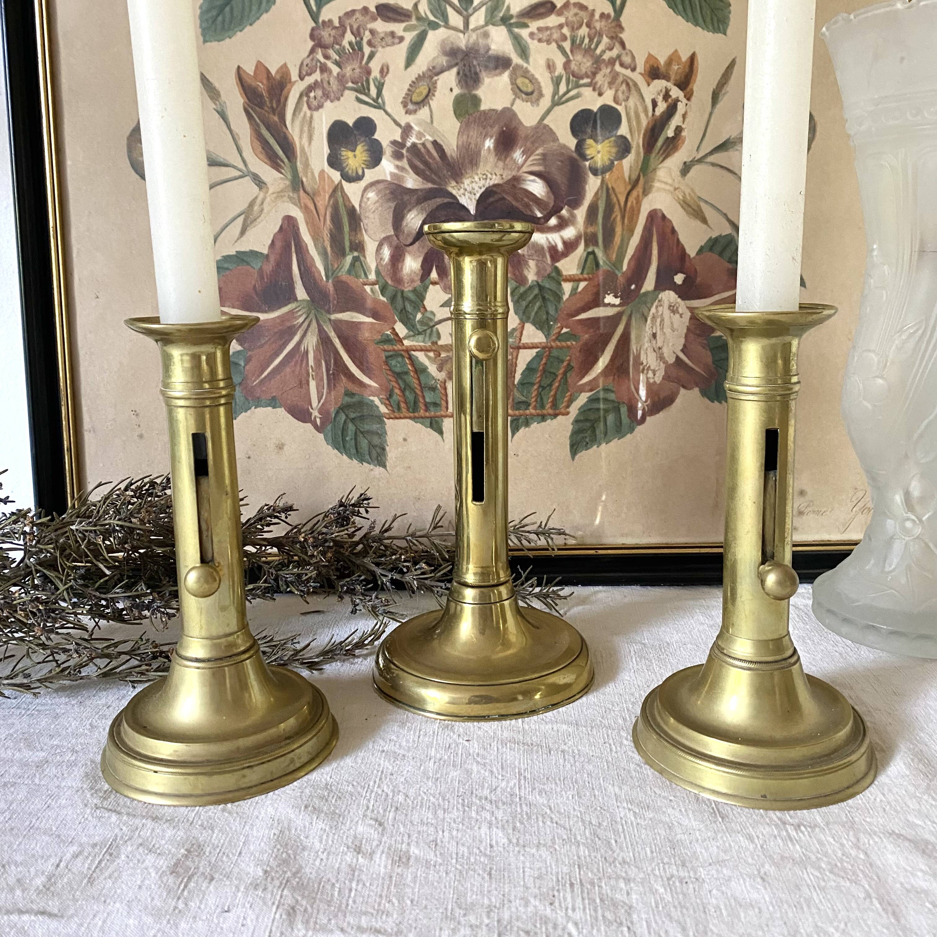 Pair of gilded brass candlesticks