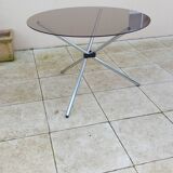 Vintage 70s table with glass and chrome legs.