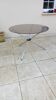 Vintage 70s table with glass and chrome legs.