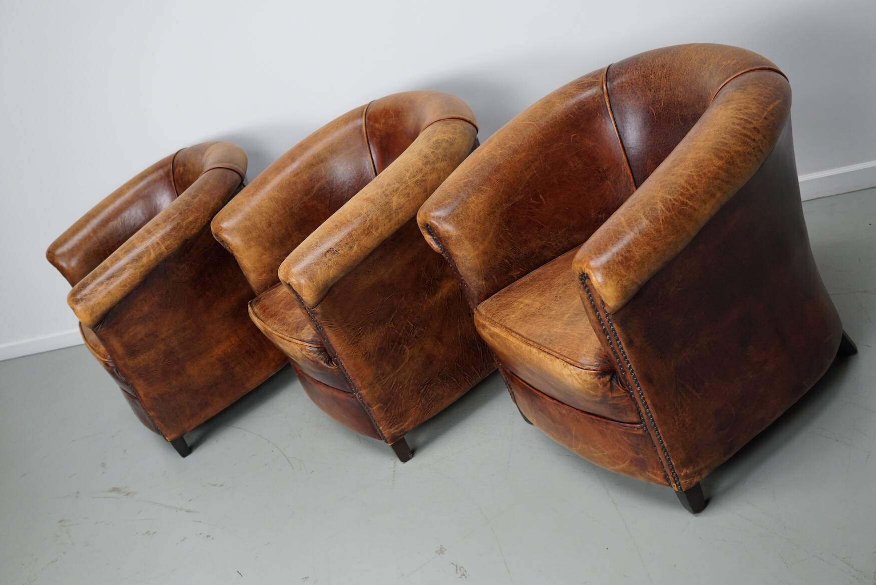 Fauteuils club vintage hollandais en cuir cognac, lot de trois