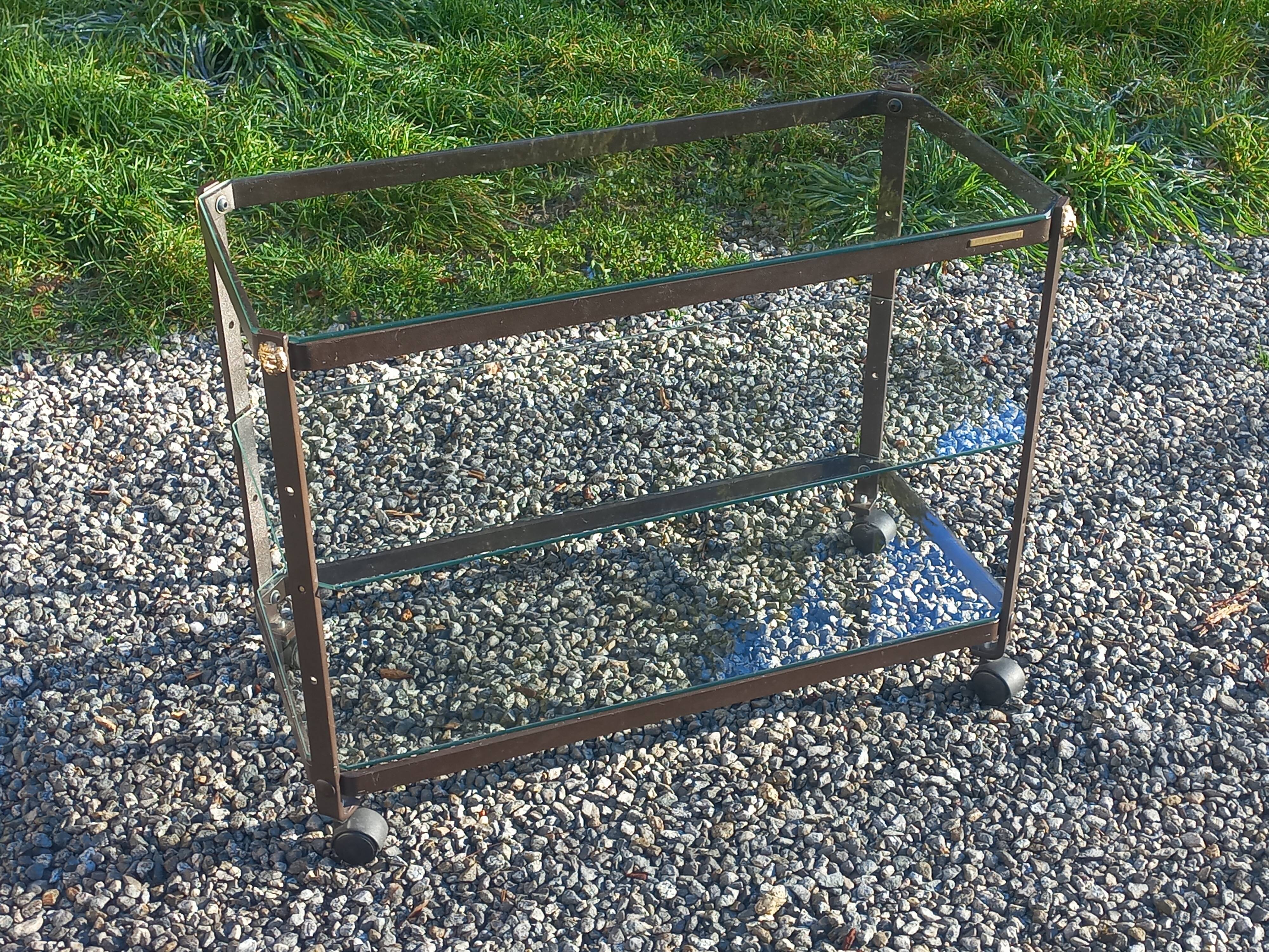 Rolling dessert trolley designed by Pierre Vandel