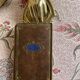 Antique gilded brass mail clip
