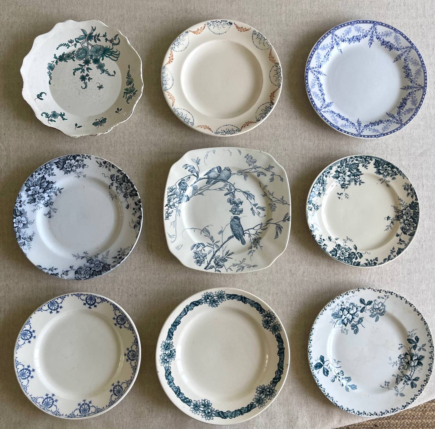 9 mismatched blue ironstone plates