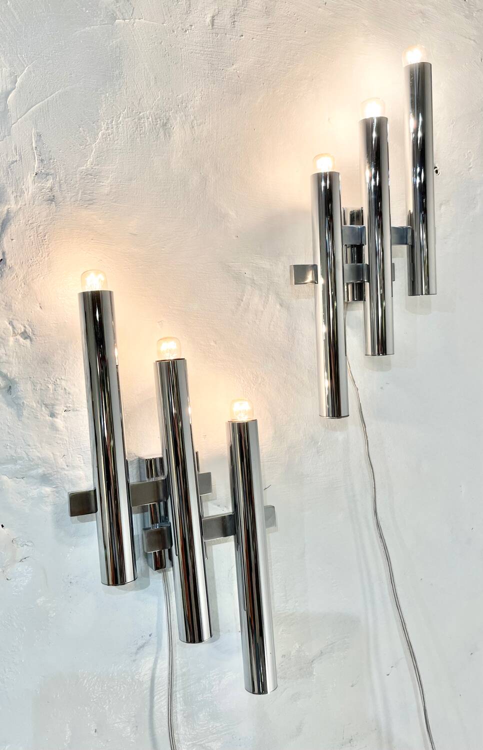 Pair of chrome wall lights by Gaetano Sciolari, 1970's