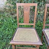 Pair of wooden and cane chairs