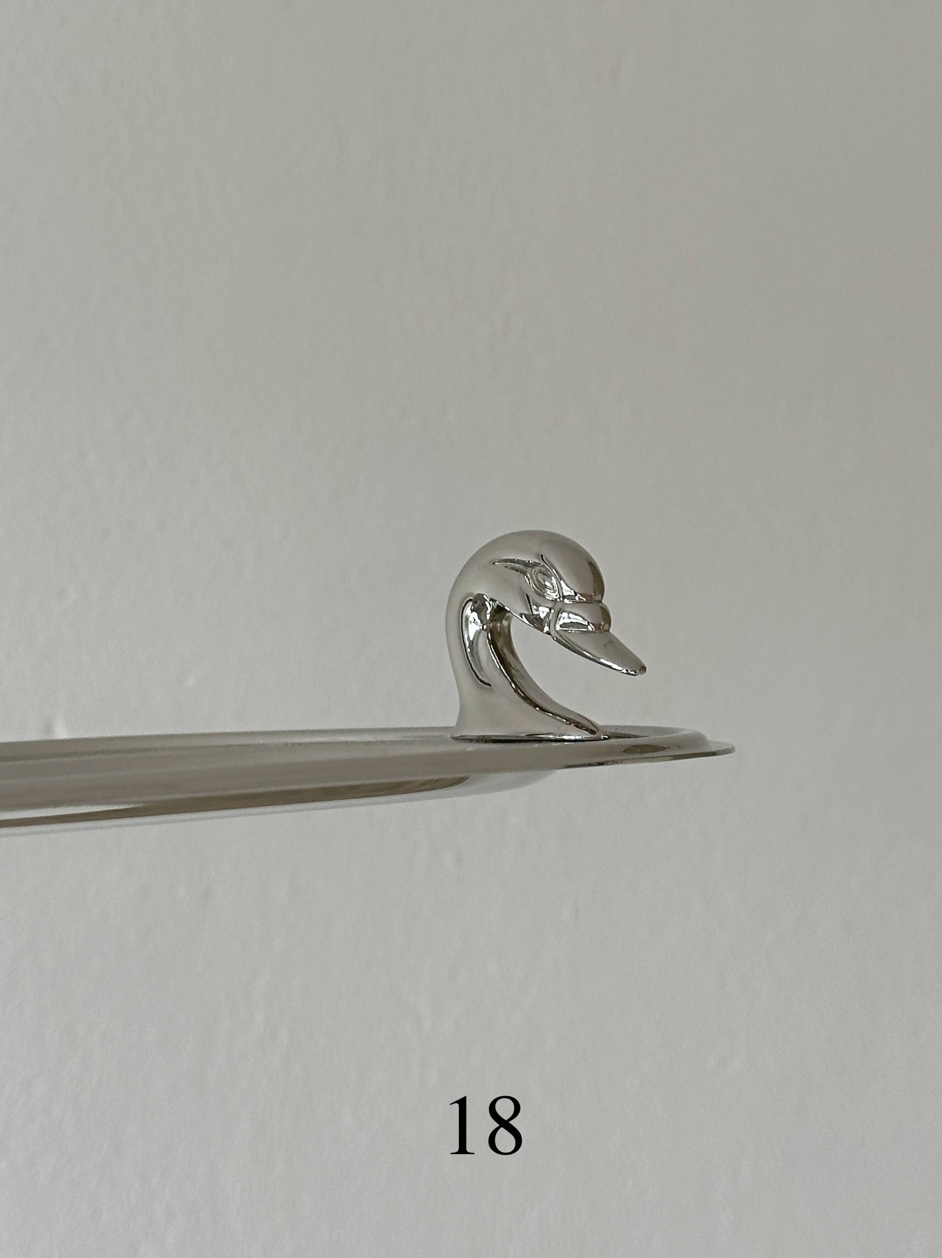 Metal dish with goose head handles serving tray