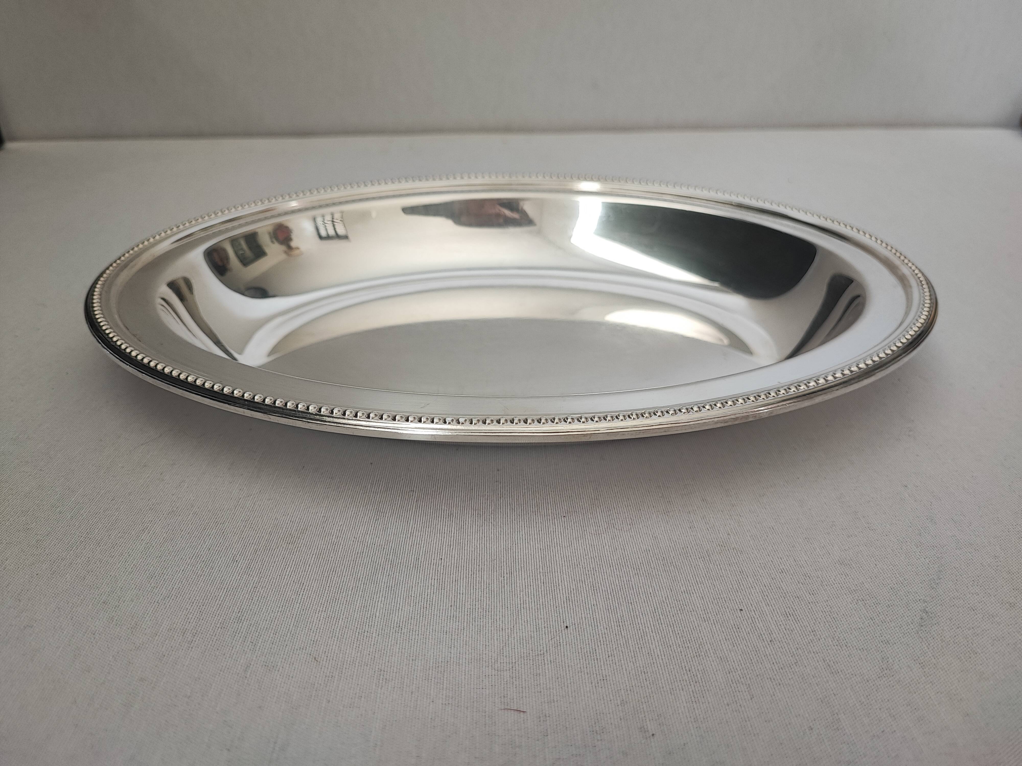 silver-plated metal salad bowl