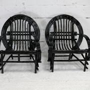 Pair of black lacquered rattan armchairs. France, cira 1960.