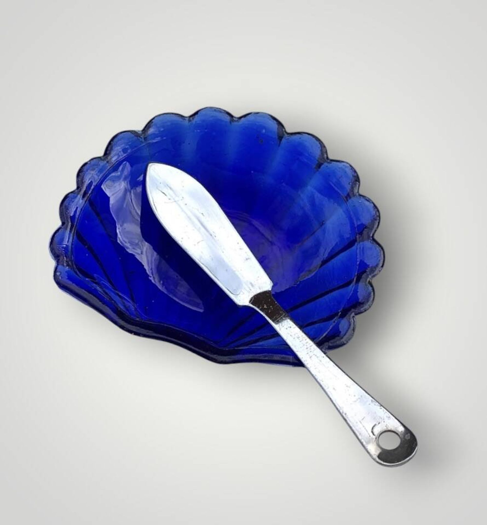 Vintage shell butter dish in stainless steel and cobalt blue glass with knife