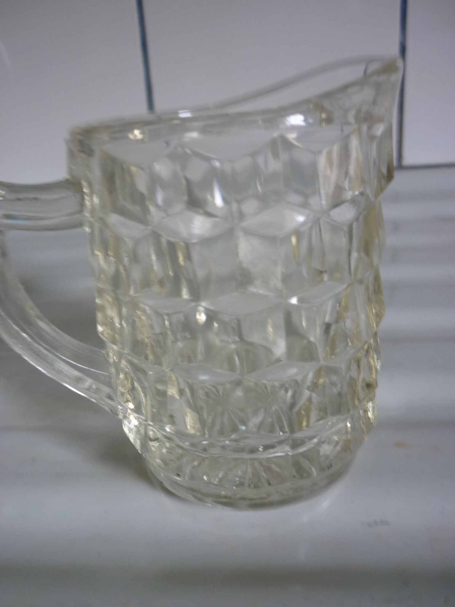 Lot of milk pots or moulded glass cream jars