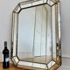 Vintage Spanish Venetian-style wall mirror, octagonal brass, 1980s Hollywood Regency