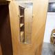 1950s Mid-Century Modern oak armoire with two doors and two drawers.
