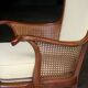 pair of mahogany and cane armchairs. English work (1960s).