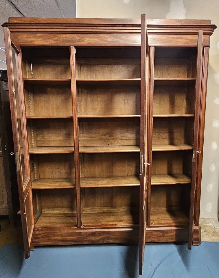 Important library stamped from the Louis Philippe period in mahogany / early