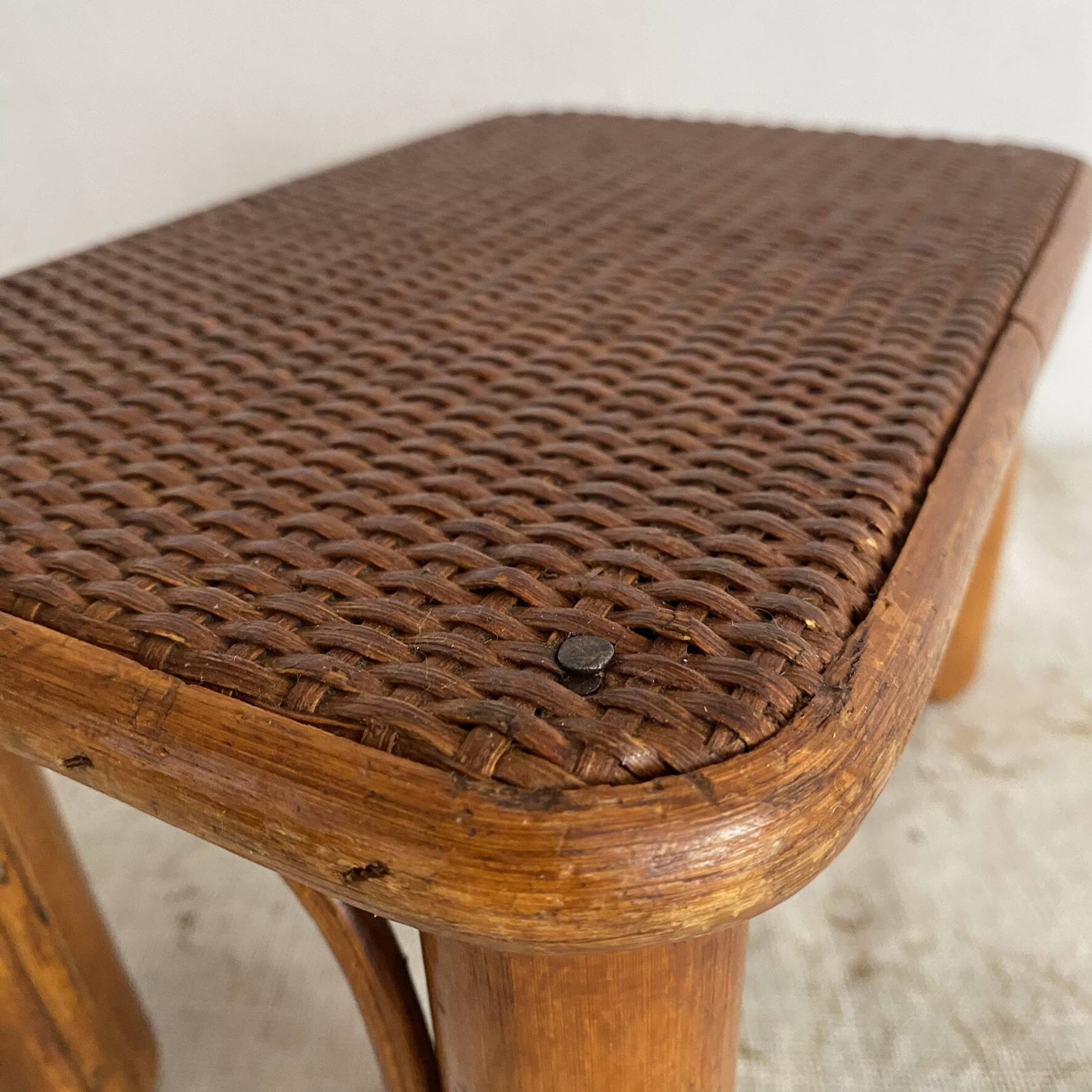 Vintage low rattan stool