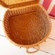 Round wicker suitcase