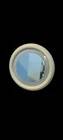 1970s mirror with integrated lighting, futuristic design, vintage wood.