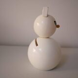 Wooden piggy bank, white cat