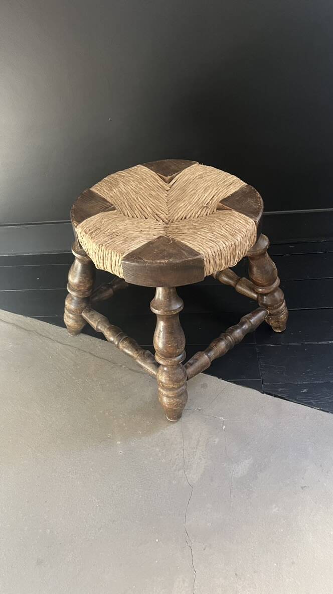 Rustic stool made of straw and wood