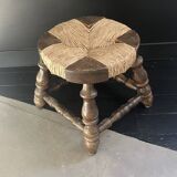 Rustic stool made of straw and wood