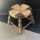 Rustic stool made of straw and wood