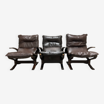 Trio de fauteuils cuir "design scandinave" 1950.