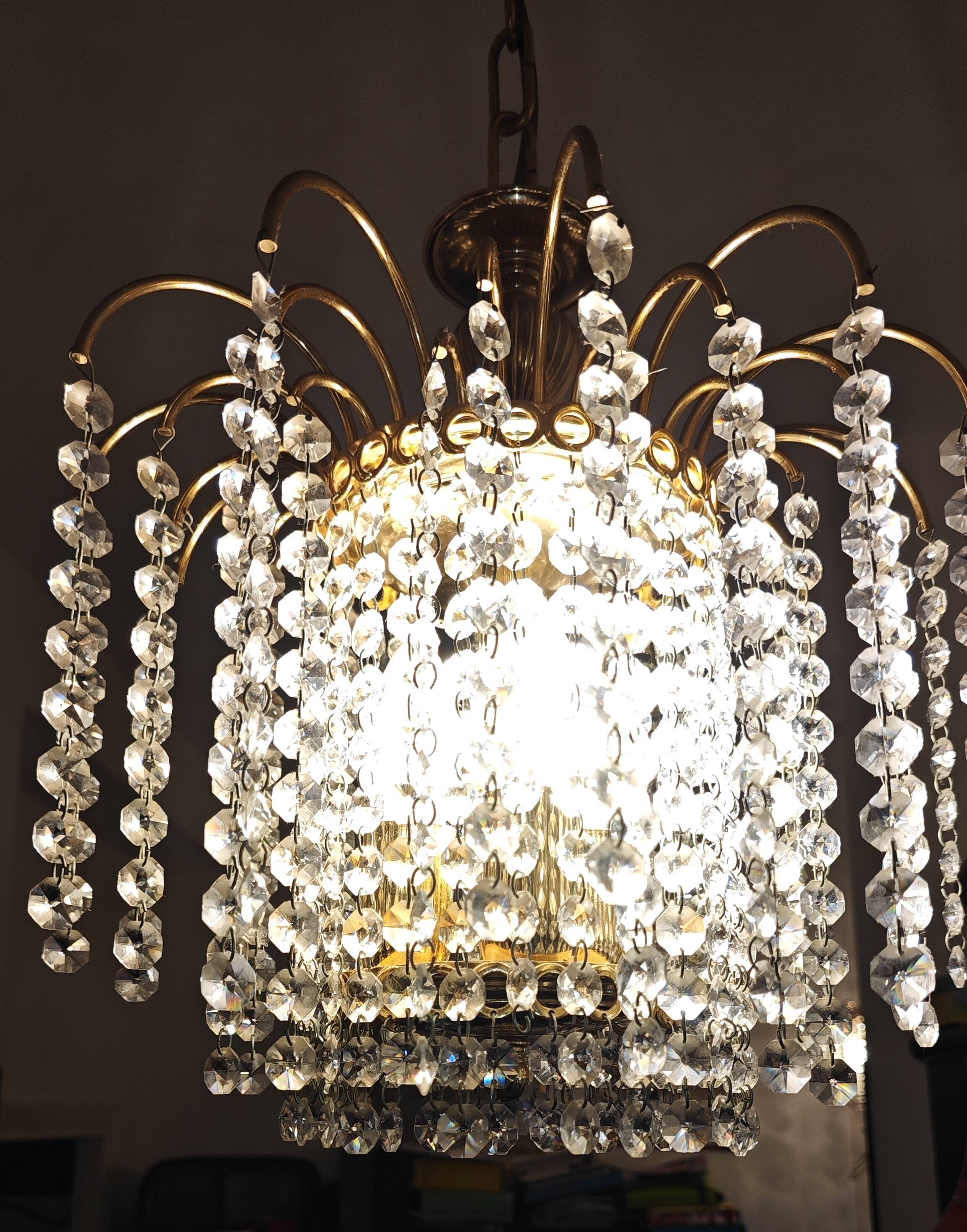 Brass cascading chandelier with crystals