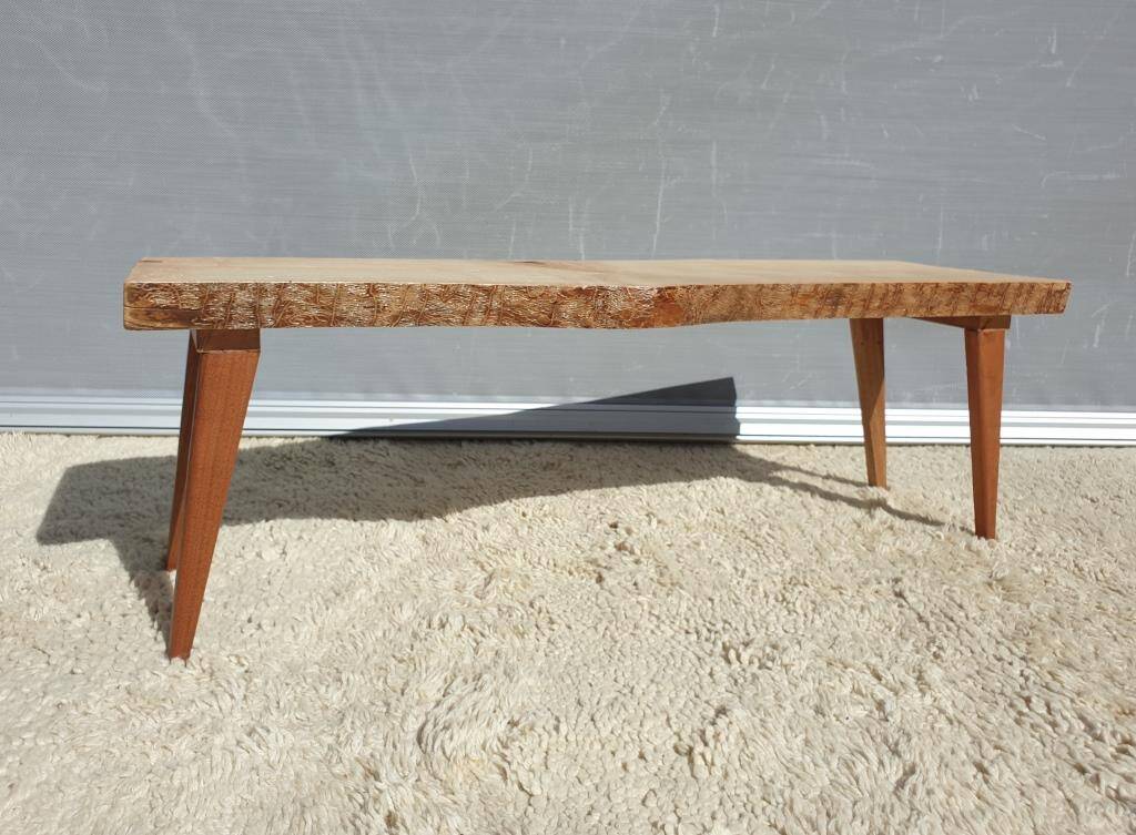Raw design coffee table with compass legs