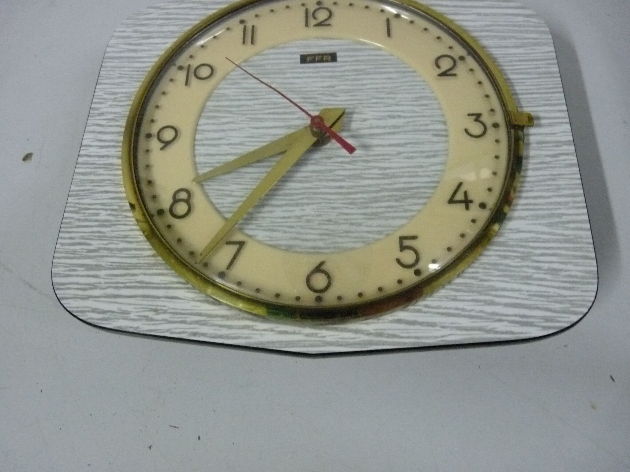 White formica wall clock