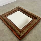 Old mirror in oak and gilded wood early 20th century beveled glass