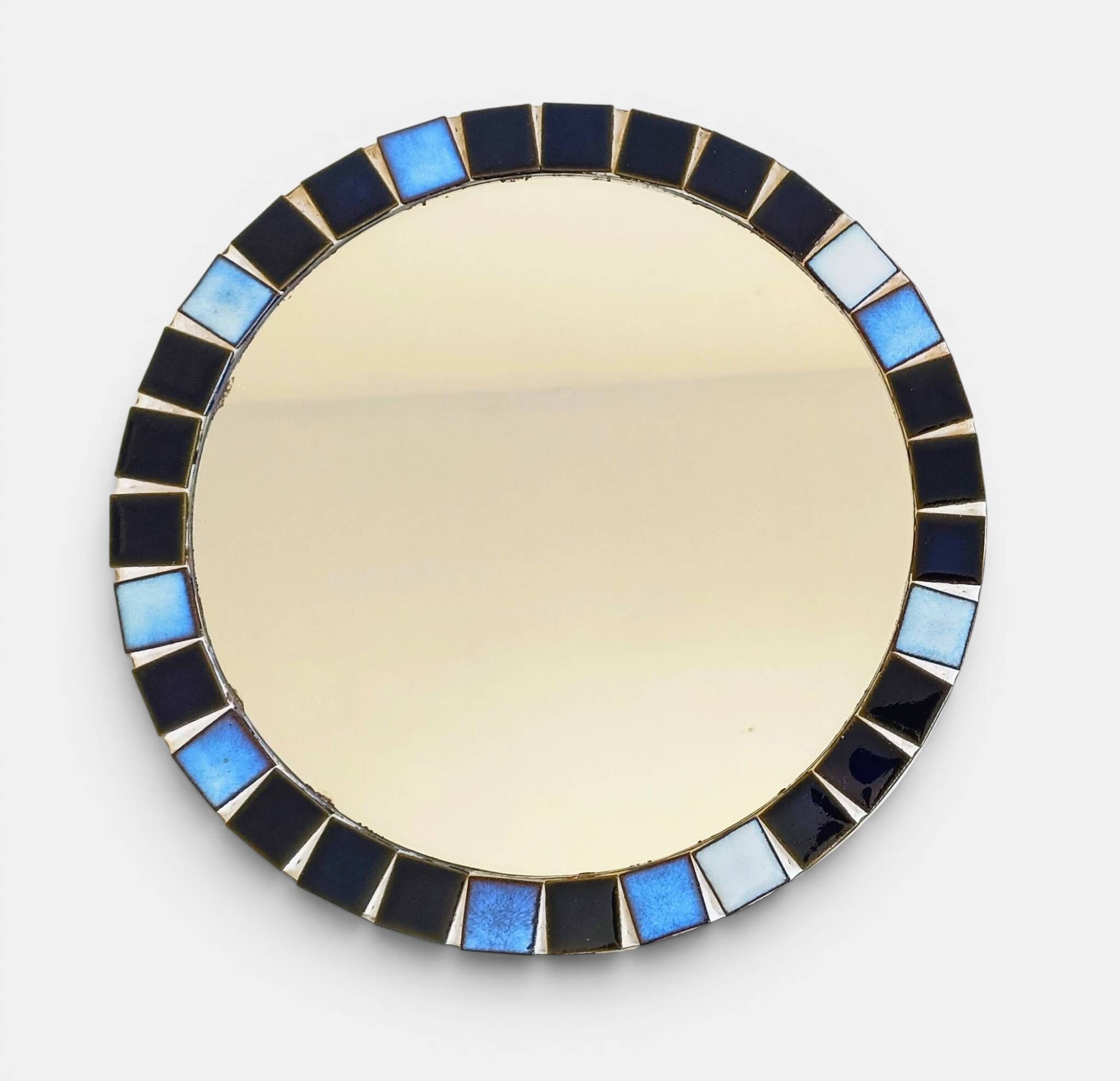 Round mosaic mirror in the style of Vallauris, France circa 1970.