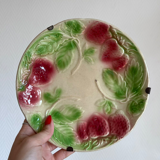 Plate in slip decoration strawberries and leaves