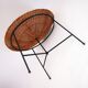 Wicker and black lacquered brass magazine rack 1960