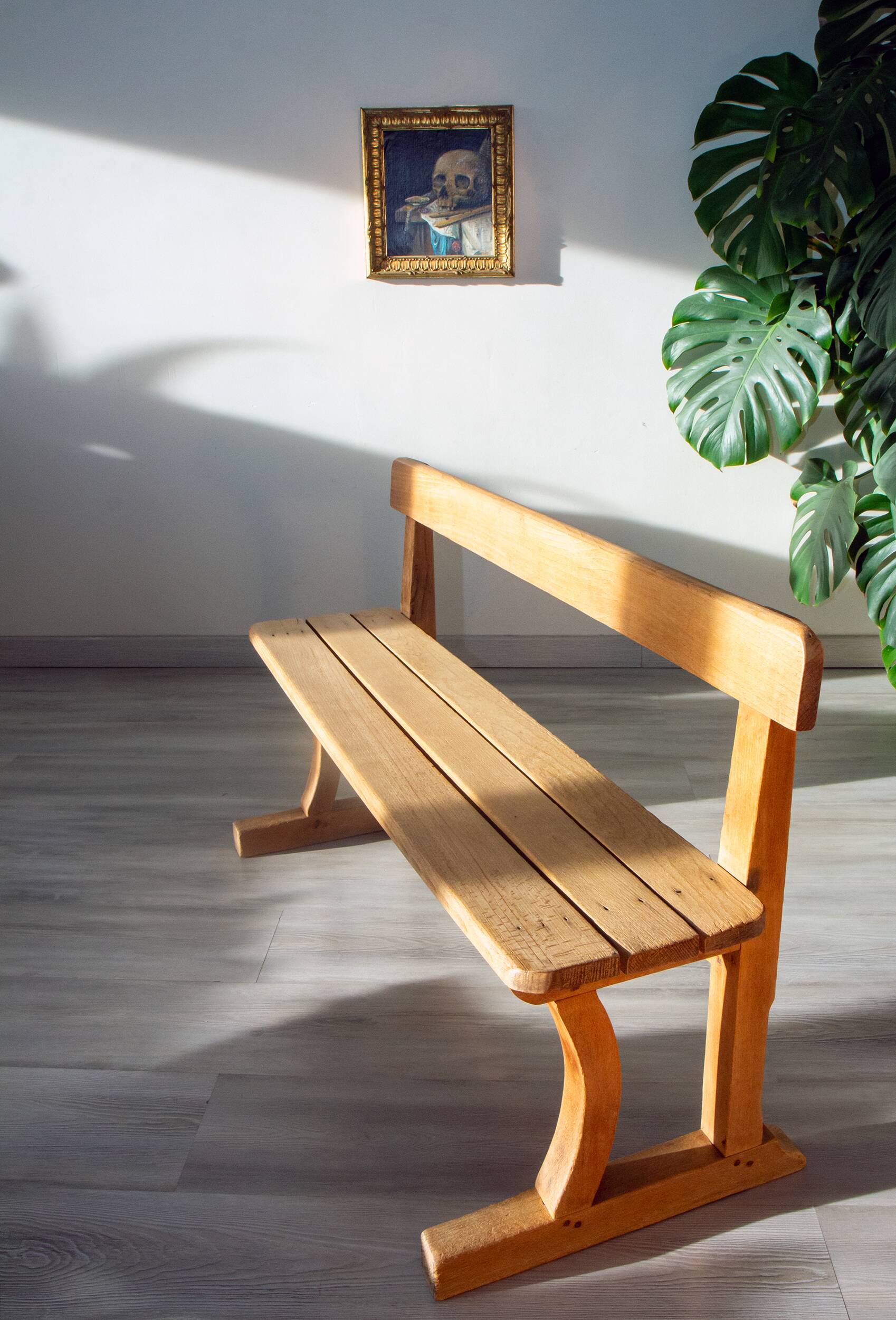 Solid wood school bench from the early 20th century.