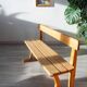 Solid wood school bench from the early 20th century.