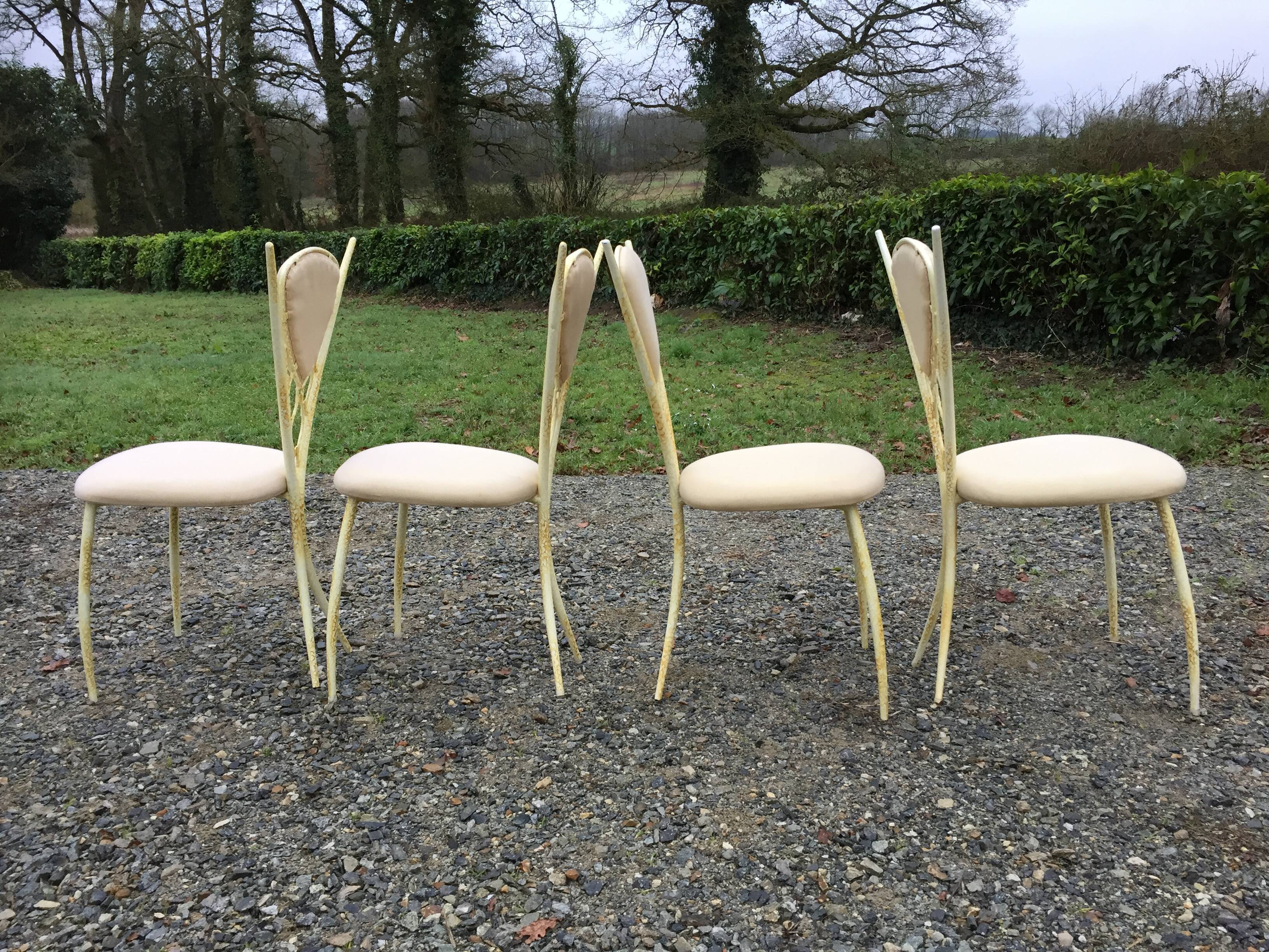 4 vintage chairs in tubular metal lacquered white yellow.