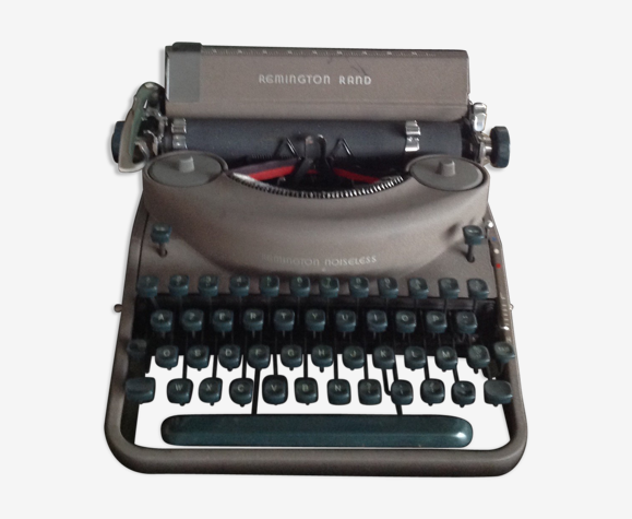 Machine à écrire Remington et son coffret excellent etat
