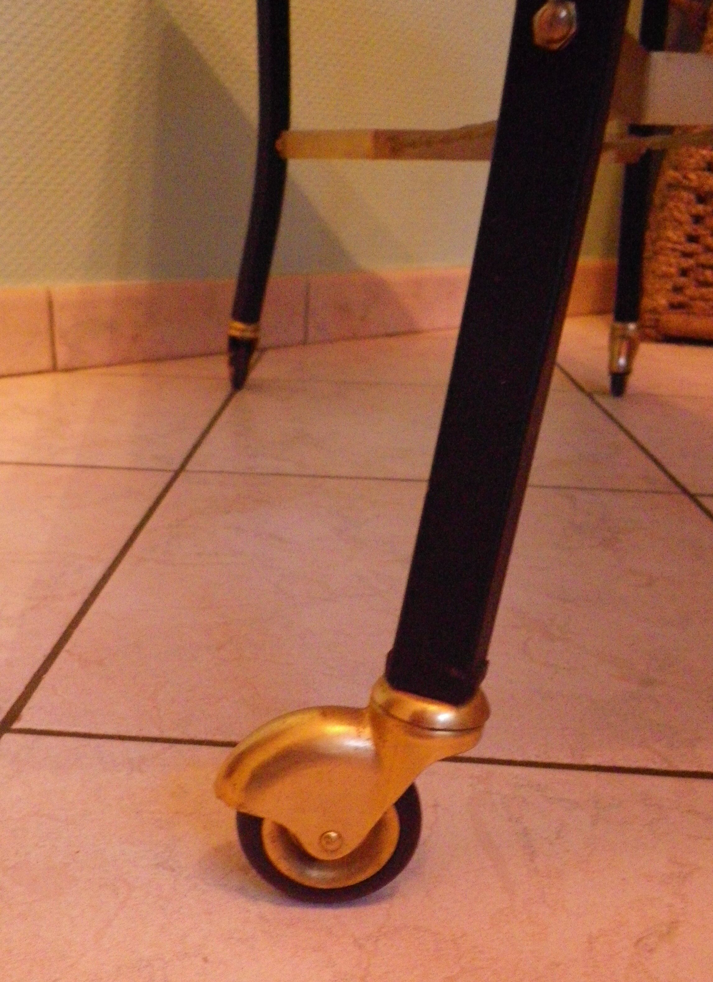 Lounge table, side table on wheels, formica top, gold and black metal