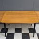Wood enlarging dining table black wood legs 1960s