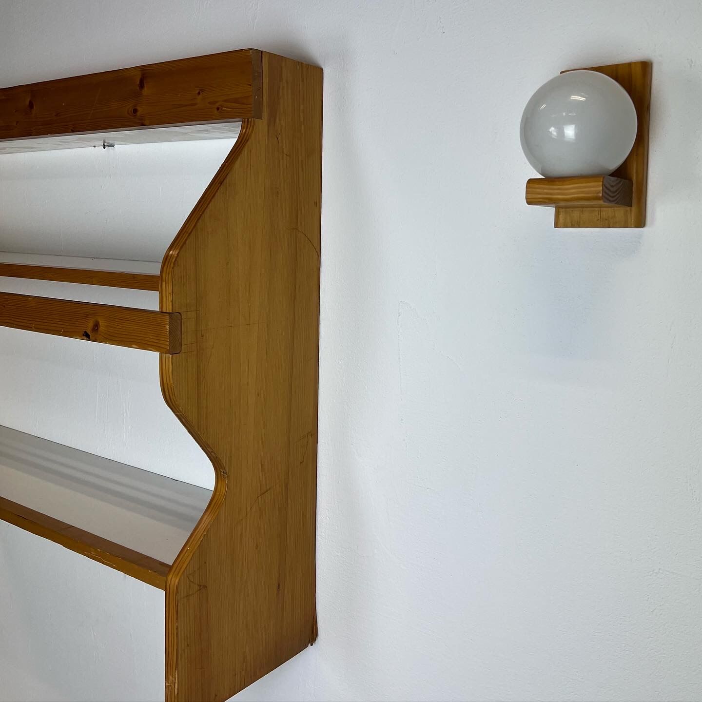 Duo of shelves by Charlotte Perriand