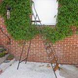 Old stepladder in metal and wood